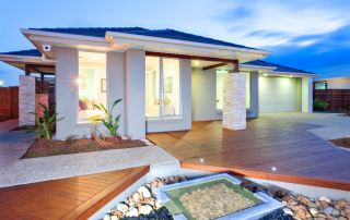 Roofing Sites in College Station, TX - Image of a Modern Mansion With Wooden Floor and Concrete Yard and Stone Dec.